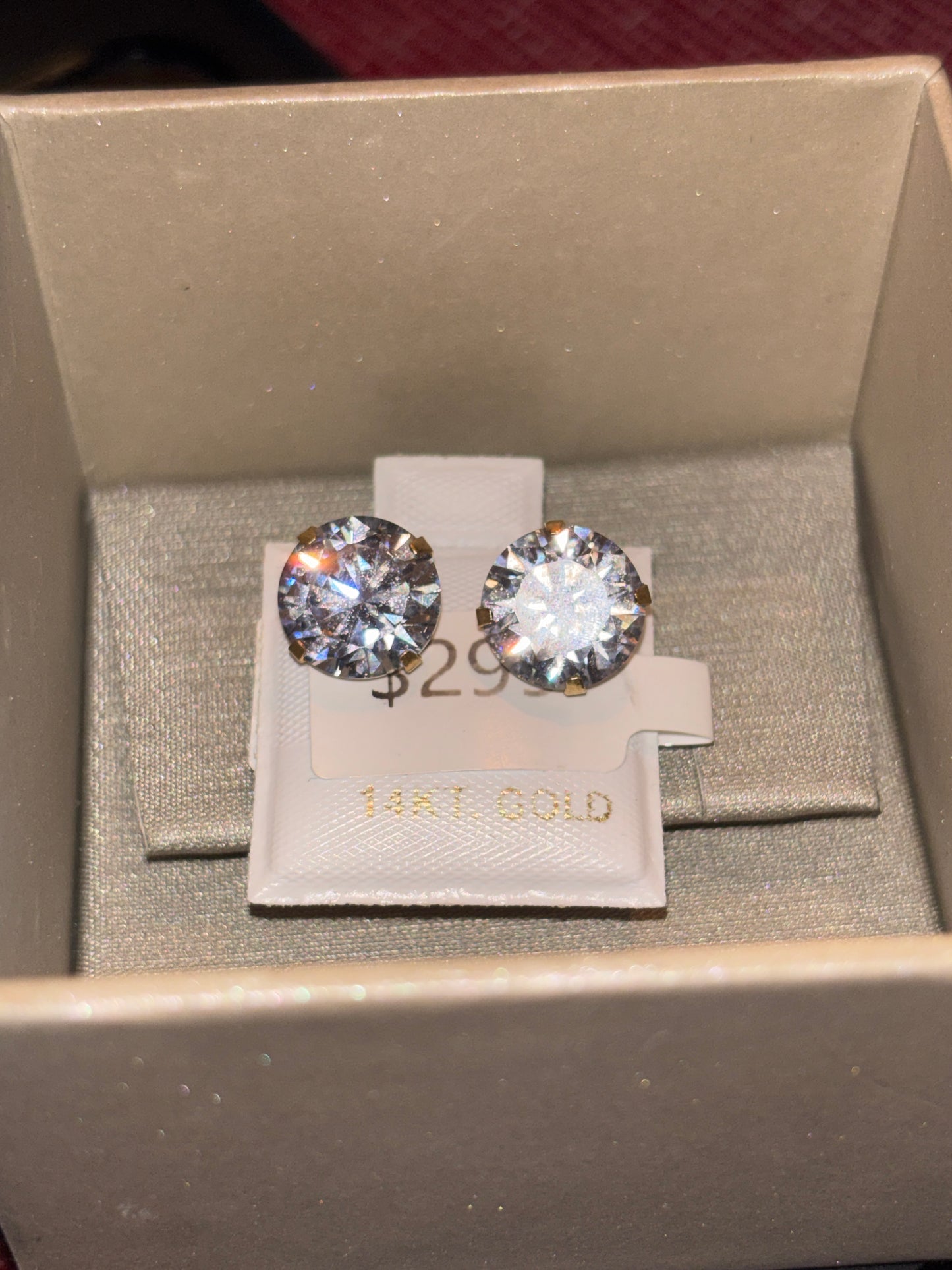 14 karat gold earrings with 1CTW VS Crystals