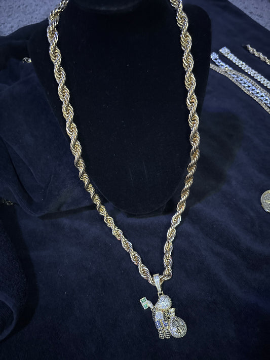 30 inch rope and moneybag boy pendant. 14 karat gold over brass with VVSCZs